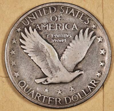 1930 Standing Liberty Quarter clashed die error showing ghost impressions from the reverse die on the obverse near Liberty's knee